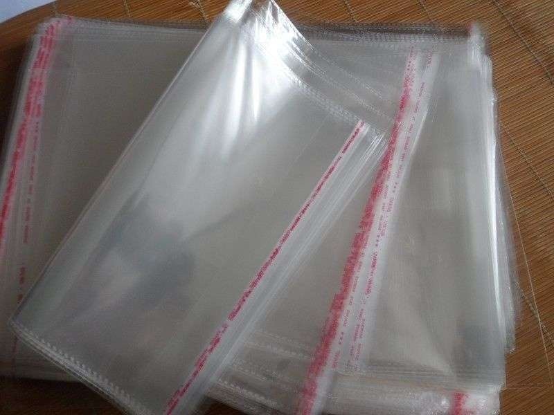 saco plástico transparente com adesivo